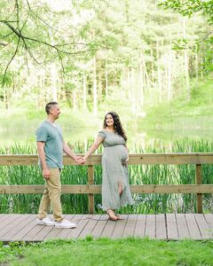 Julia and her husband by the pond